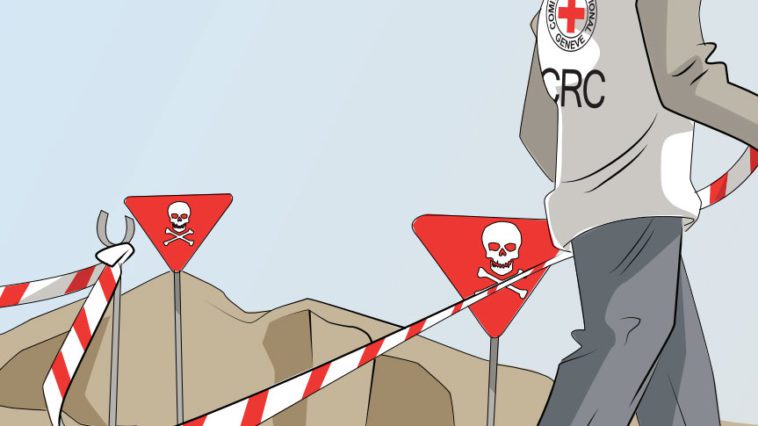 An ICRC worker with taped off containment area