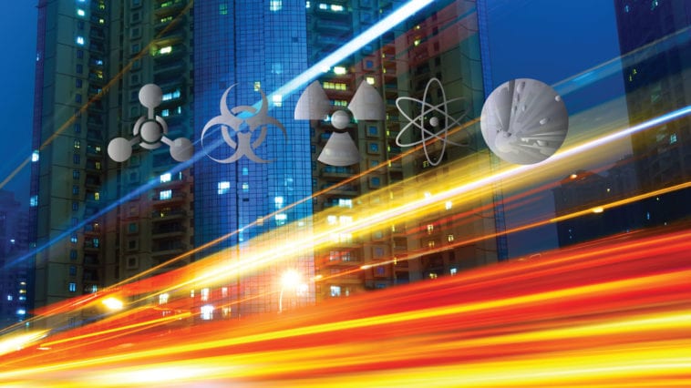 Chemical, Biological, Radiological, Nuclear and Explosive threat symbols on cityscape backdrop