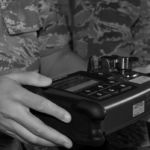 U.S. Air Force Senior Airman Gabriel Albano, 18th Aerospace Medicine Squadron bioenvironmental technician, discusses the different capabilities of a HazMatID Elite Kadena Air Base CBRN Expo