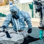 A Soldier of the 222nd Chemical Company, based at Fort Hamilton, Brooklyn, N.Y. (right) conducts a simulated decontamination with a member of the New York Police Department's Chemical Ordnance, Biological and Radiological Awareness (COBRA) unit. Credit: Harley Jelis NYPD COBRA Patient Decon Training With Army National Guard