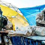 Personnel check a casualty during a training exercise simulating a joint response to a chemical attack and decontamination situation. Credit: Harley Jelis Chemical Attack Casualty Training